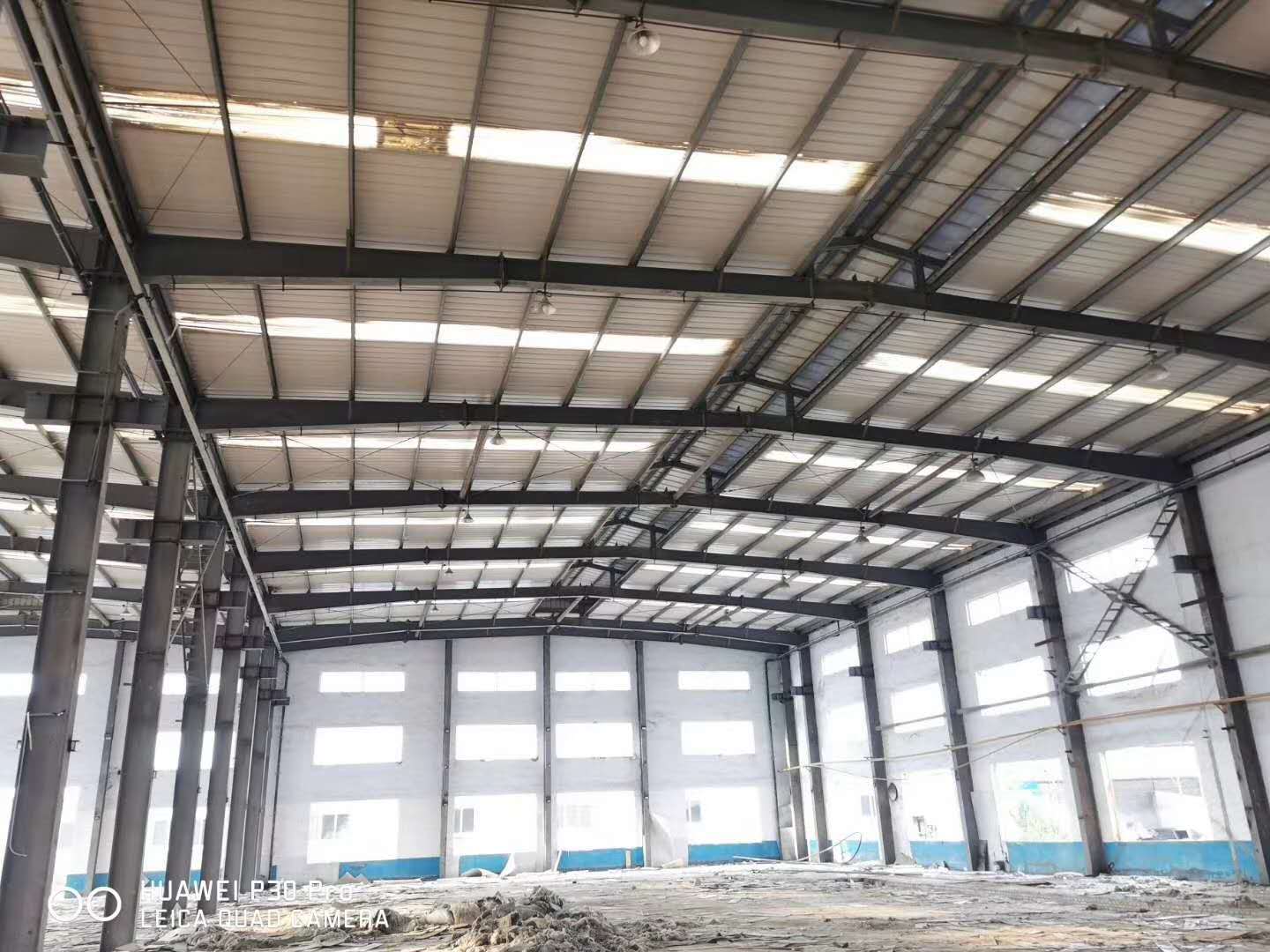 长期出售精品钢结构厂房二手行车房钢结构立柱 承接钢结构工程图片